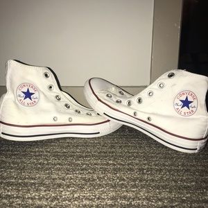 Lightly wore white converse